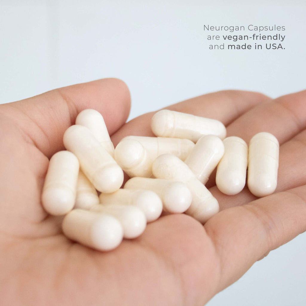 Deazaflavin capsules from Neurogan Health held in hand, vitamin supplement for health and wellness.