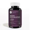Neurogan Health micronized Trans-Resveratrol capsules in a clear jar, showing the front label and capsules inside in a shadowed setting.