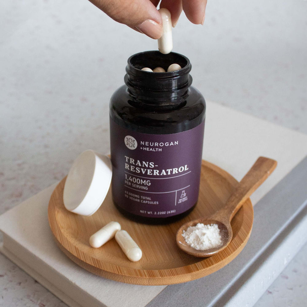 Neurogan Health Resveratrol capsules in a bottle, showing the supplement's label and capsules inside, on a white background.