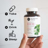 Neurogan Health Dihydromyricetin (DHM) capsules with a spoon and glass of water showing how to take the supplement.